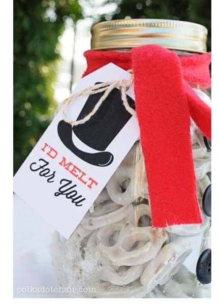 Mason Jar Snowman gift idea filled with white chocolate covered pretzels